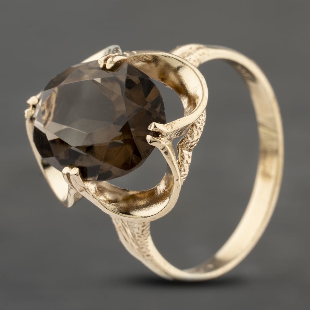 Pre-Owned 9ct Yellow Gold Smokey Quartz Oval Scollop Design Dress Ring 41103294 Pre-Owned 9ct Yellow Gold Smokey Quartz Oval Scollop Design Dress Ring 41103294